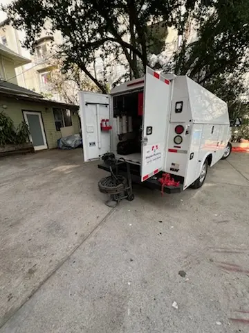 Magnet Plumbing service vehicle on-site for Grease Trap Cleaning in Catalina